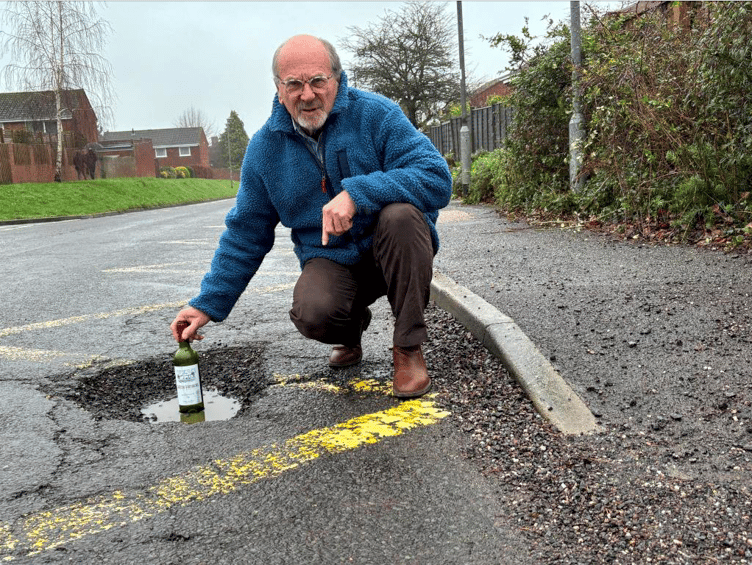 Wellington town Cllr Keith Wheatley is concerned this deep pothole between Wellesley Park and Homefield could kill an unwary motorcyclist or cyclist.