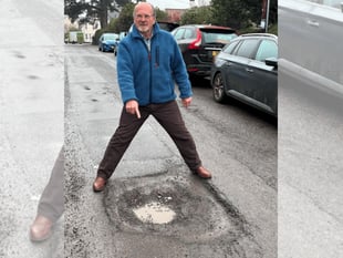 The potholed road vying for 'worst in town'