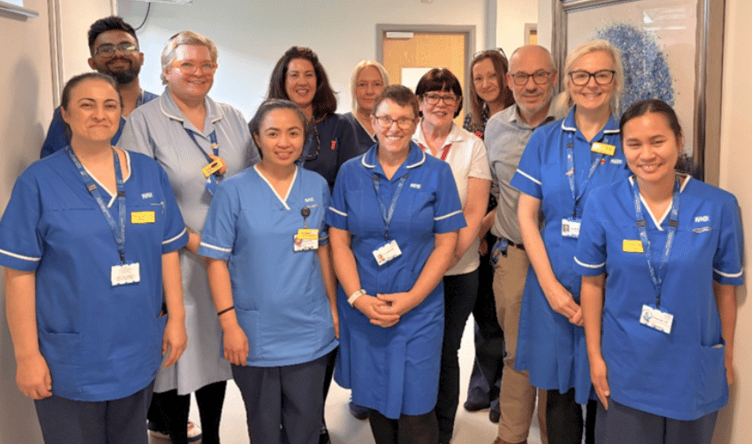 Some of the POAC team in their new home at Dene Barton Community Hospital, Cotford St Luke.