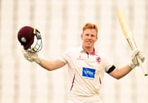 Somerset's wicketkeeper Rew signs new deal