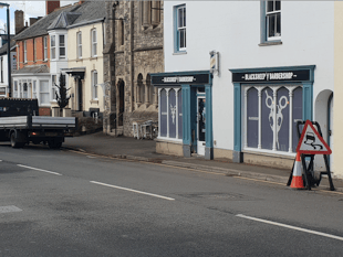 Woman seriously hurt in town centre crash