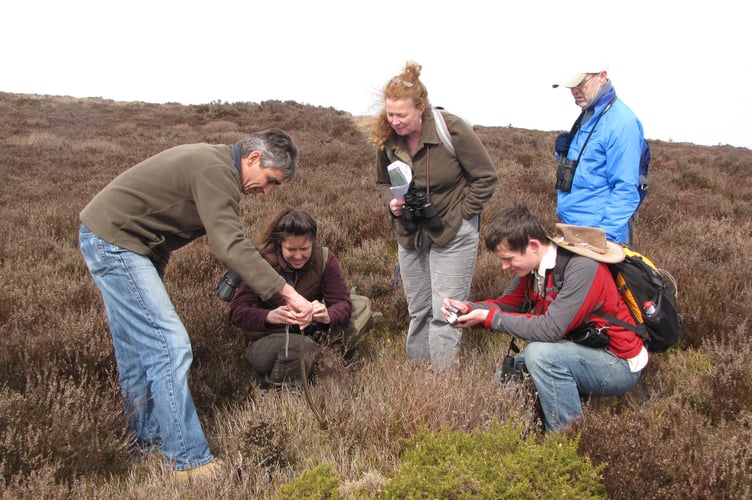 John Dickson with volunteers on the Quantocks.