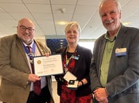 Retired headteacher surprised with top award