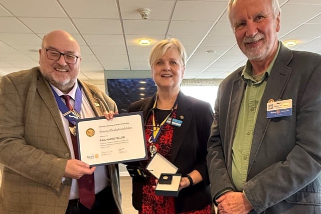 Retired headteacher surprised with top award