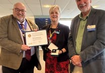 Retired headteacher surprised with top award at Rotary Club