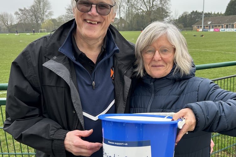 Alison Baker pictured with Wellington AFC's chairman Mike Hall.  