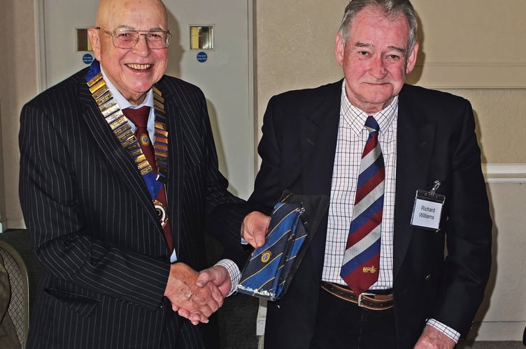 New president David Badham (left) presenting Richard Williams with his past president's tie. 