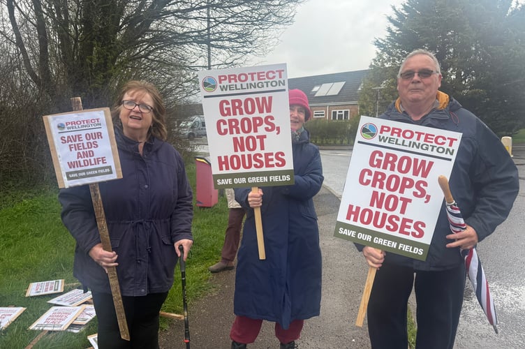 Caroline Gudgeon, Claire Hamilton and Steven Gudgeon attended the protest against the Pegasus proposed housing development in Wellington.