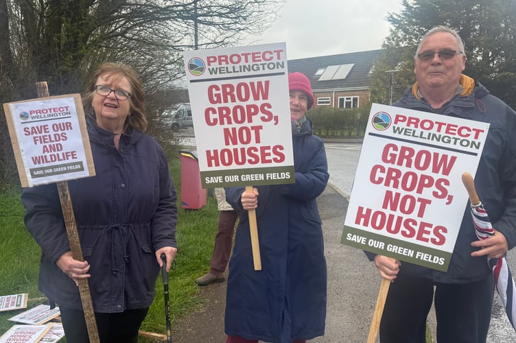 Caroline Gudgeon, Claire Hamilton and Steven Gudgeon attended the protest against the Pegasus proposed housing development in Wellington.