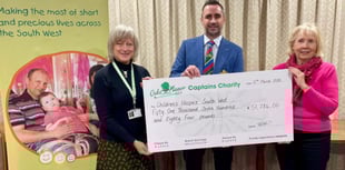 Oake Manor present cheque to Children's Hospice South West