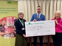 Oake Manor present cheque to Children's Hospice South West