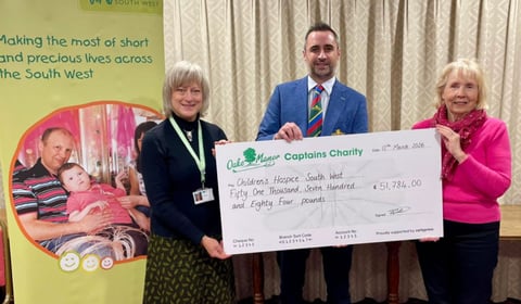 Oake Manor present cheque to Children's Hospice South West