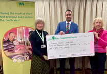 Oake Manor present cheque to Children's Hospice South West