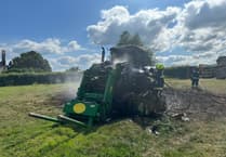 Tractor and field of elephant grass destroyed in farm blaze