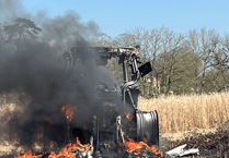 Tractor and field of elephant grass destroyed in farm blaze