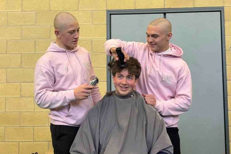 The three year 11 pupils from Court Fields School raised over £1000 for Macmillan Cancer Support 