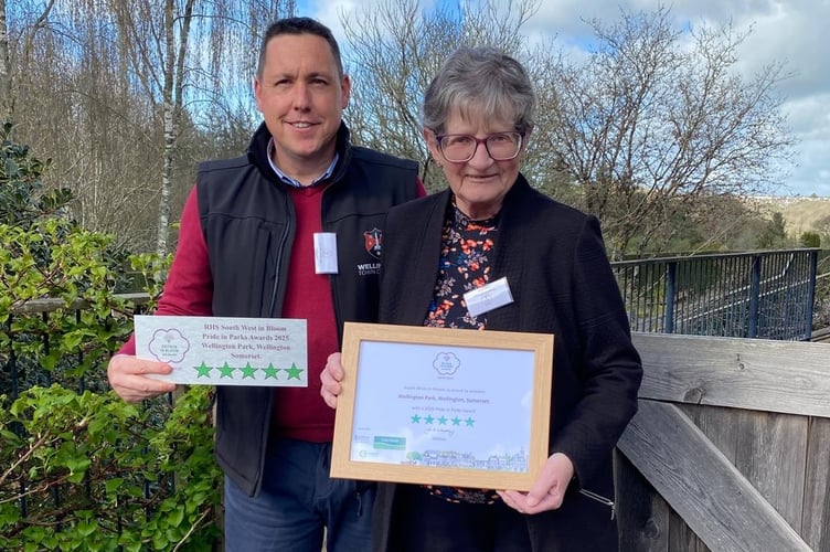 Open Spaces Manager Darren Hill and Mayor Janet Lloyd were presented the RHS Pride in Parks award at RHS Rosemoor