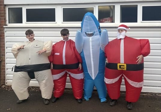 A sumo wrestler, two Santa's and a shark ran in the charity race