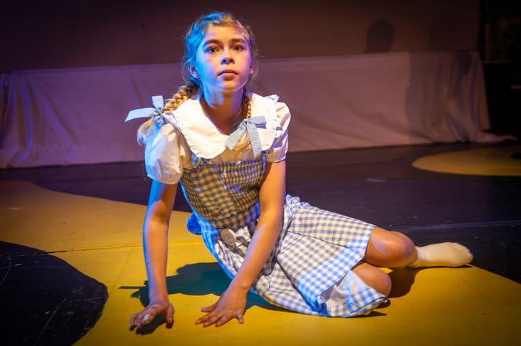 Dorothy on the yellow brick road in Wellington School's latest production of The Wizard of Oz