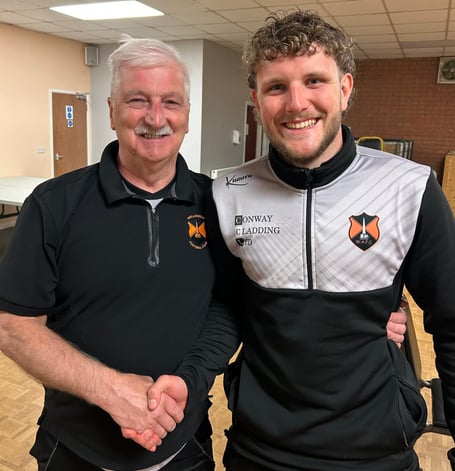 Player of the match Sam Poole (right) is pictured with Ken Pearson who sponsored the game with his wife Gill. 