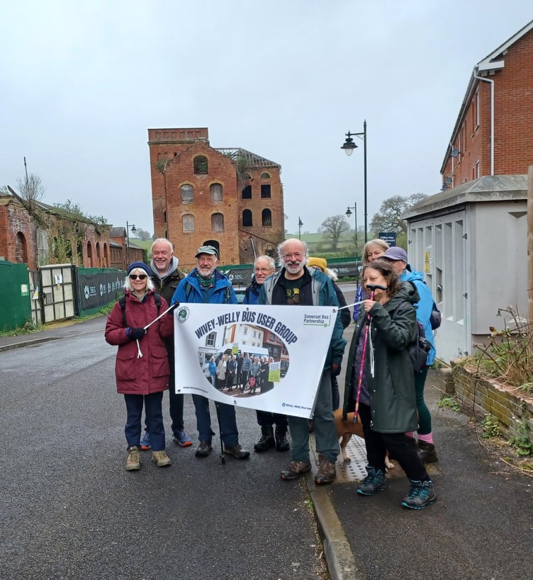 Arriving in Tonedale, Wellington, are members and friends of the Wivey-Welly Bus Users Group who marked the one-year anniversary of the 27 bus connecting the town with Wiveliscombe.