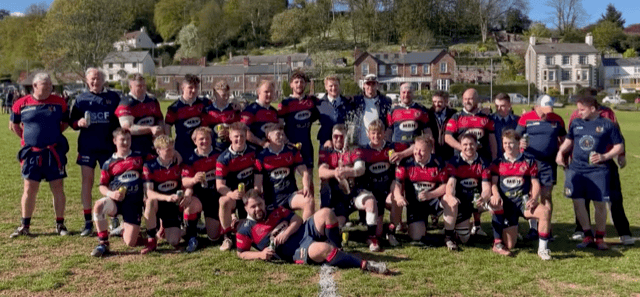Wiveliscombe celebrate their title success.