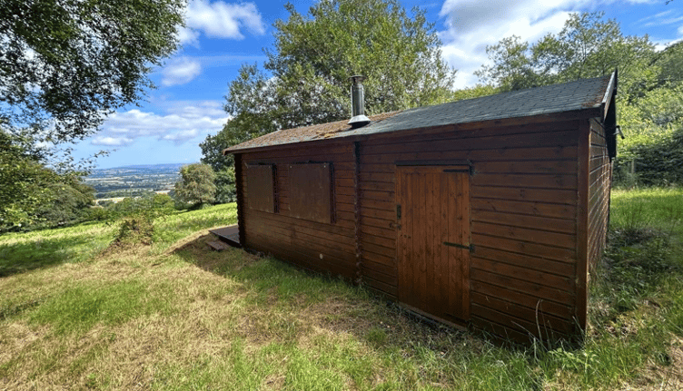 A view over the Blackdown Hills from a log cabin off Ford Street sold at auction by GTH.