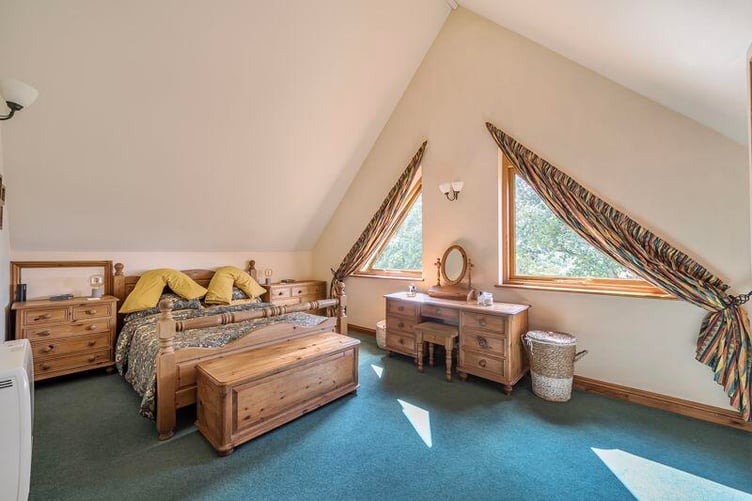 To the first floor there are four bedrooms