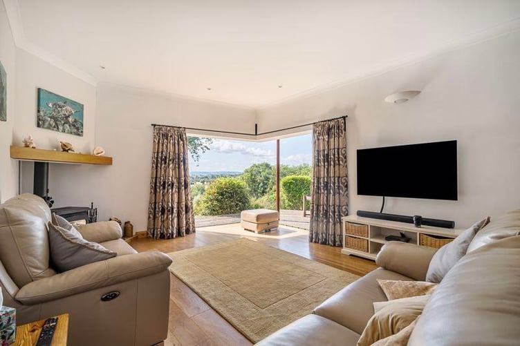 Patio doors lead onto the decking area, making this the ideal entertaining space