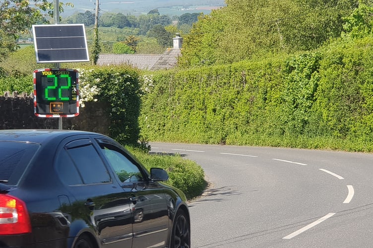 A motorist drives through Ford Street with a speed indicator device showing he is well inside the 30 mph speed limit.