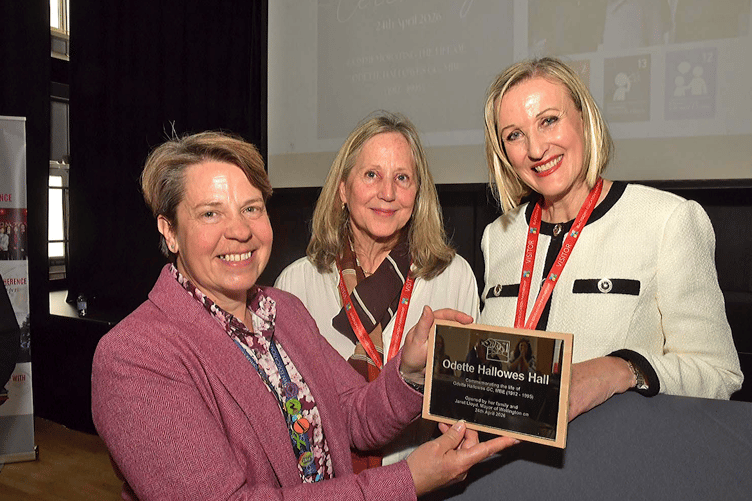 Court Fields School headteacher Polly Matthews with Caroline Biddle (centre) and Sophie Parker, granddaughters of Odette Hallowes, who named the school's new hall.