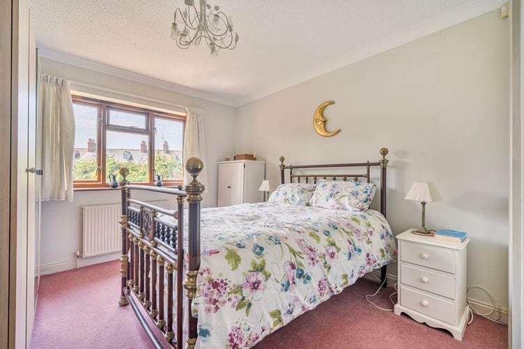 There are three bedrooms with bedroom two enjoying sliding patio doors directly into the garden