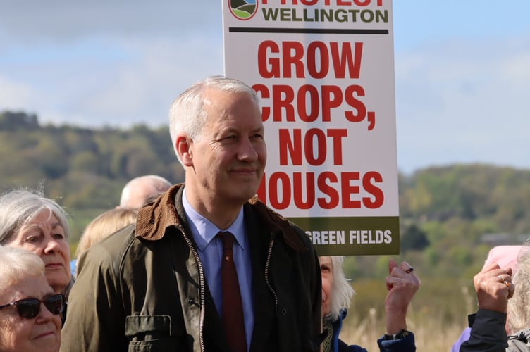 MP Gideon Amos attending a Protect Wellington demonstration against housing plans on fields outside the town development boundary.