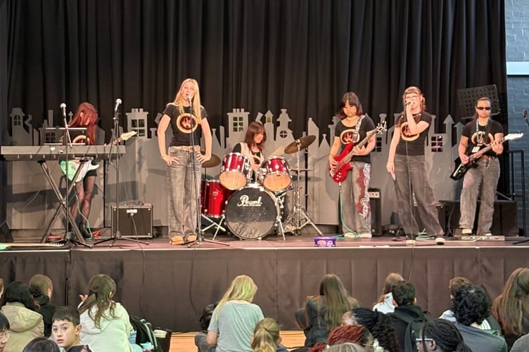 Student band Slowburne drew a large crowd and were joined on stage by school staff for their last song.