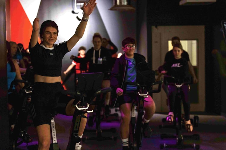 Sporting Champions in a group cycle class with Lauren Steadman MBE.