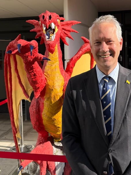 'Proud' Somerset MP for Taunton and Wellington, Gideon Amos, with newly named Somerset Dragon 'Dunkery'.