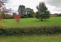 Police alerted as 'traveller' caravans seen moving into Wellington field near school