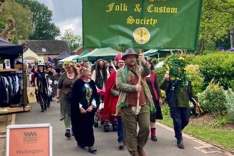 The folk parade was lead by 'Lord of the Wild' the society's banner bearer. PHOTO: Wellington Museum
