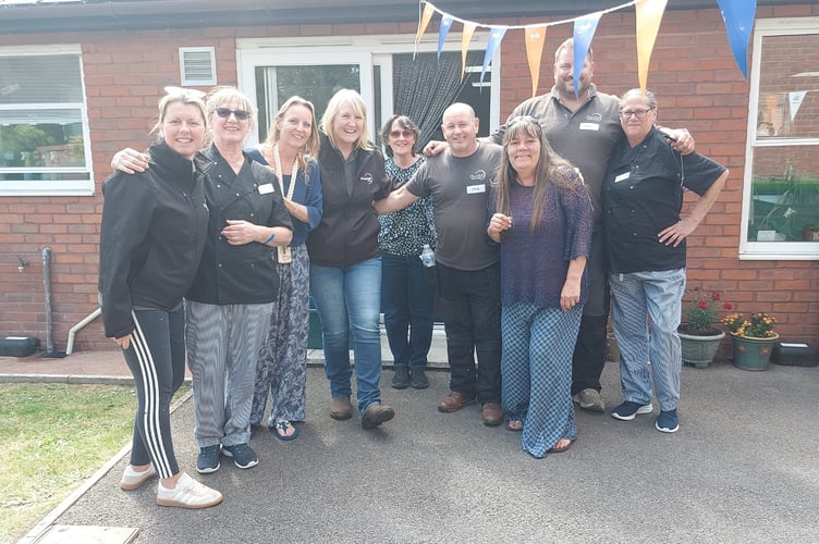 Local corporate volunteers spent the day at The Old Vicarage helping to make the garden summer-ready.