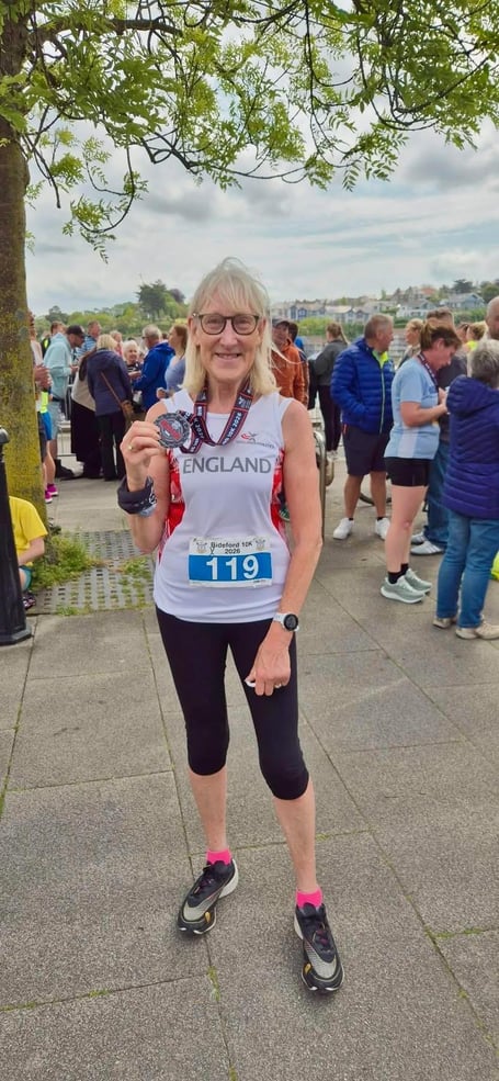 Wellington Museum volunteer Chris Williams in her England running vest at the recent Bideford 10K.