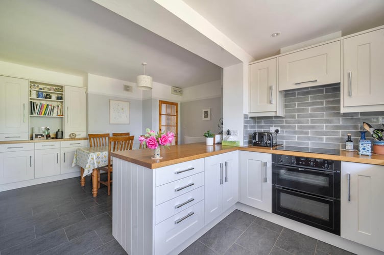 The main social hub of the home is the extended and well-appointed kitchen/diner