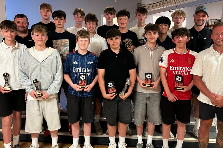 Front row, from left, Harvey R (captain), Zac C, George S, Joby H, Riley L, Riley N, Jon Stanyard (coach). Middle, Tom Richards (coach), Freddie J, Callum S, Ollie H, Quentin C, Luke Bryant (coach). Back, Filip L, Harvey M, Charlie L, Joshua S, Freddie T.