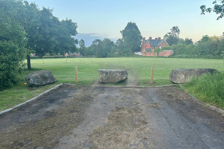 Boulders now form a temporary barrier to protect a green off Hoyles Road, Wellington, after a 'traveller' incursion.