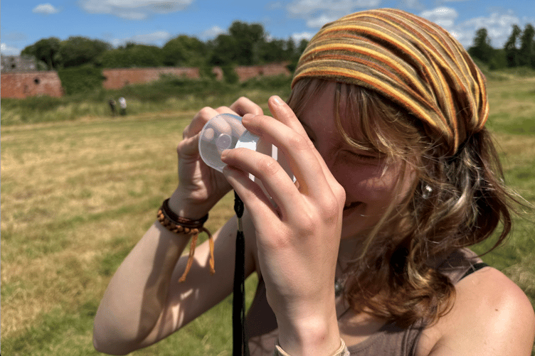 A 'citizen scientist' takes part in a Transition Town Wellington 'bioblitz' event.
