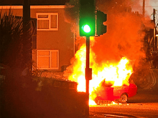 Family escape dramatic car fire
