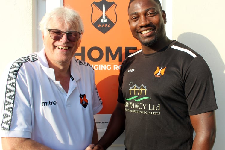 Wellington's new manager Tornado Bello (right) with chairman Mike Hall