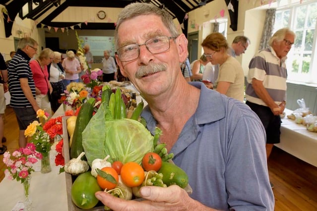 Mike Broom with his prize-winning tray of mixed vegetables, winning overall most points in show.