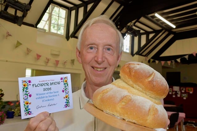 Graham Hatcher with his winning entry of a Cottage loaf which also won best in cookery section.