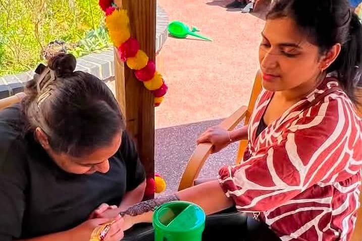 Hannah and Harsha painted Henna tattoos as well as treating residents to a taste of Indian food.