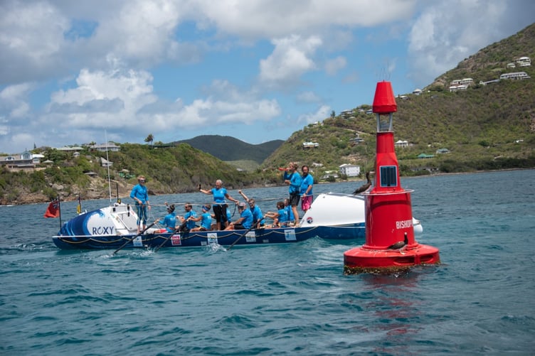 The Rannoch ocean-rowing boat Roxy has a crew of 12, each taking turns to row six hours on, six hours off.